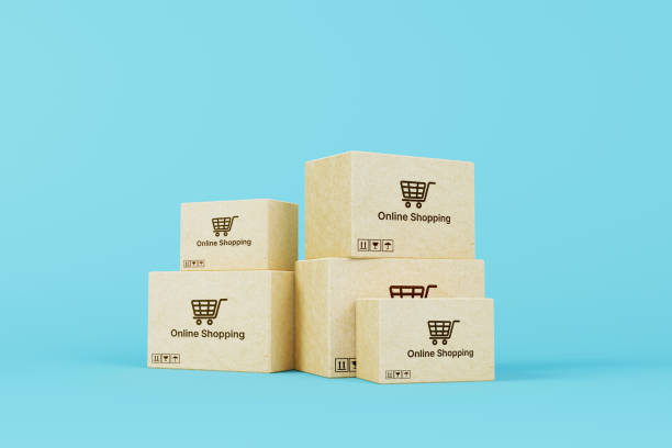 istock Online shopping concept. Web or mobile application e-commerce. Carton paper box on blue background. 3d rendering 1357992867
