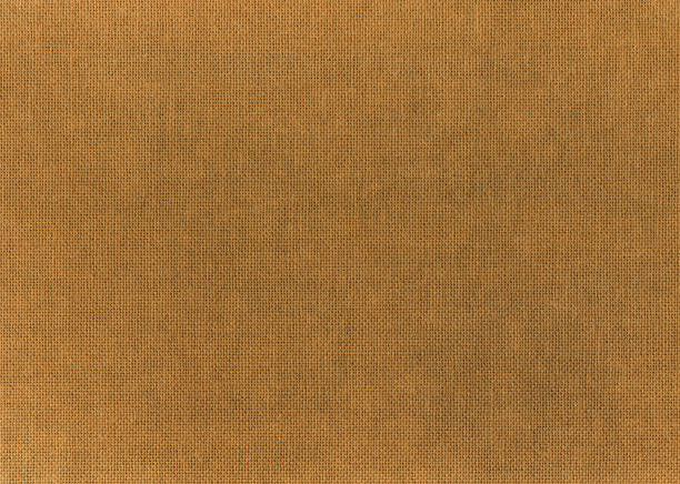 Textured brown linen fabric texture for backgrounds