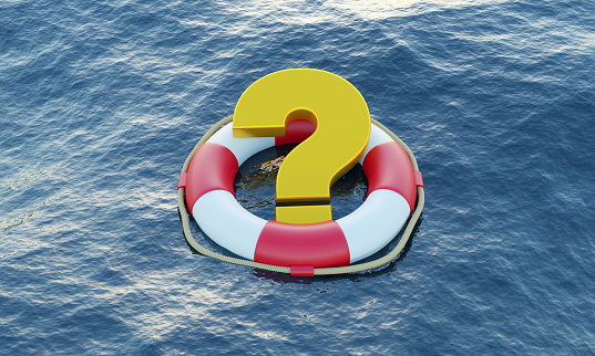 Lifebuoy and question mark on the ocean. Rescue and assistance concept.