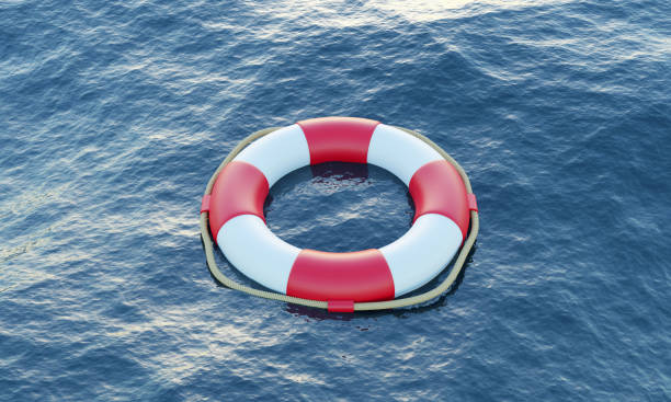 istock Lifebuoy on the ocean 1357998200