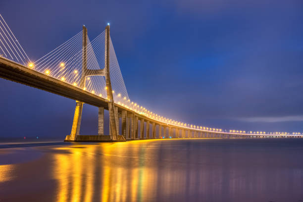 istock The imposing cable-stayed Vasco da Gama bridge across the river Tagus 1357998781