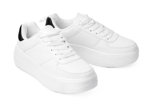 istock New pair of white sneakers isolated on white 1358000973