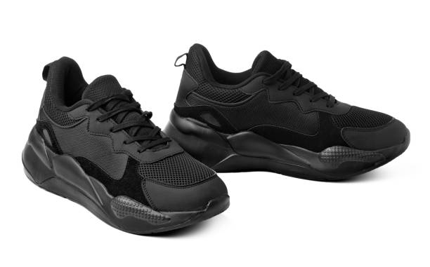 istock New black sneakers isolated on white background 1358001285