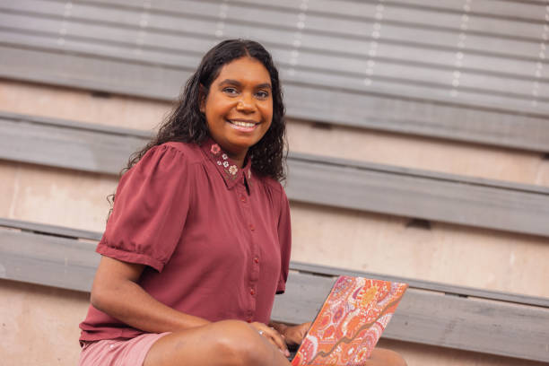 istock Female Aboriginal Australian Student Working On Laptop 1358003696