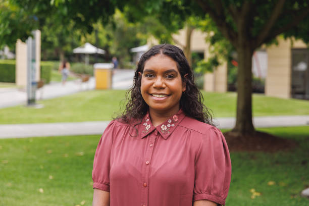 Female Aboriginal Australian Student Portrait Of Female Aboriginal Australian Student On University Campus aborigine woman stock pictures, royalty-free photos & images