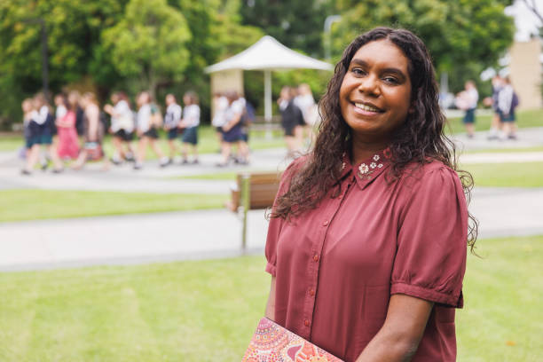 istock Female Aboriginal Australian Student Holding Laptop 1358004907