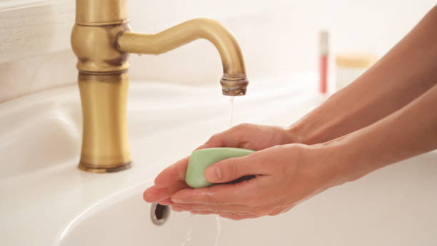 istock Woman is washing her hands. 1358008245
