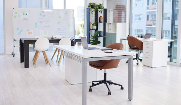 Still life shot of a modern office space Where innovative ideas are born neat office stock pictures, royalty-free photos & images