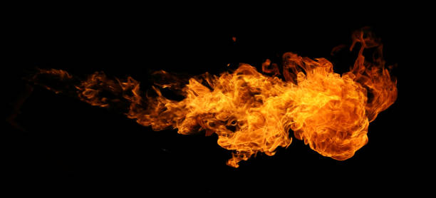 istock Fire and burning flame torch isolated on black background for graphic design usage 1358009412