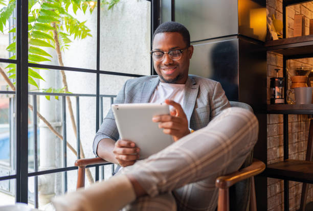 Male Freelancer At Coffee Shop