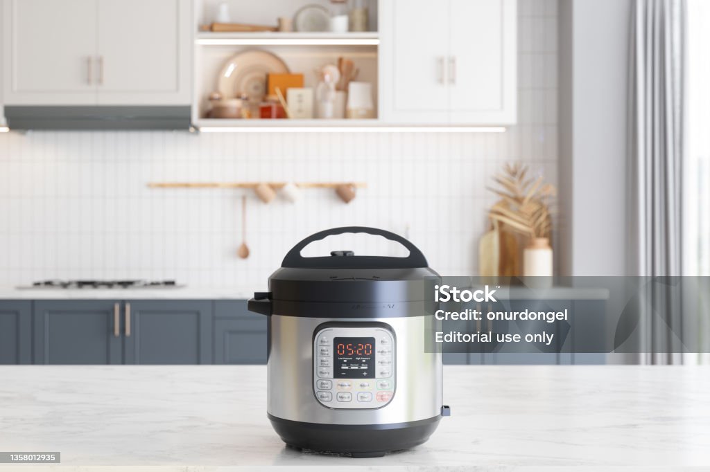Multi Cooker On Empty Marble Surface With Blurred Kitchen Background Multicooker Stock Photo