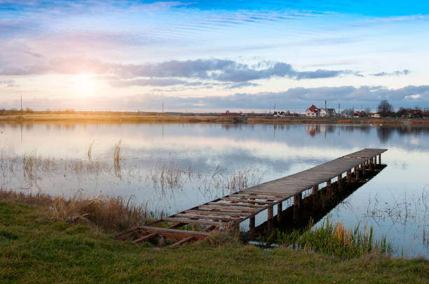 istock wooden jetty at the lake 1358013943