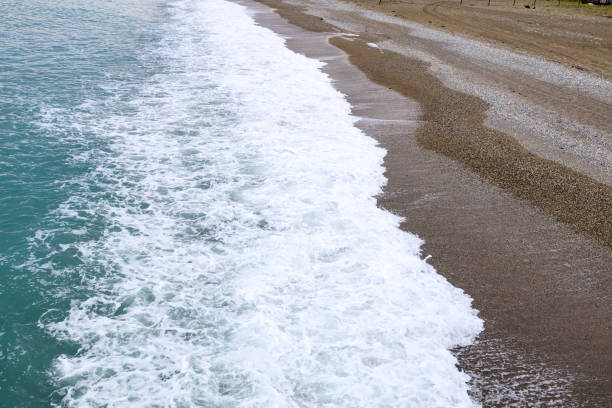 Sunset on the beach.crashing waves