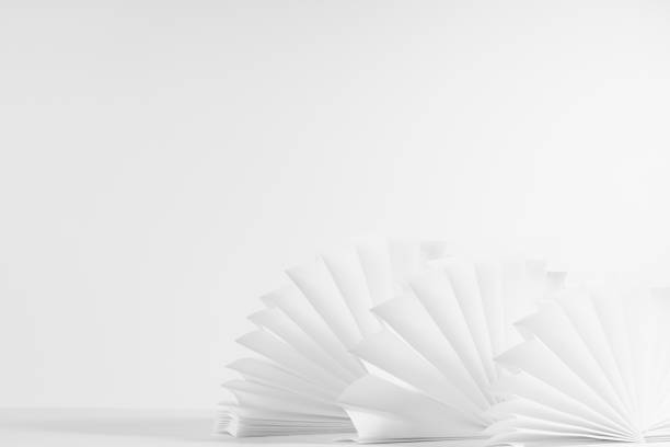 istock White oriental ribbed semicircle paper fans on table as modern simple minimal decor in abstract stage, geometric background in simplicity style, copy space, closeup. 1358023671