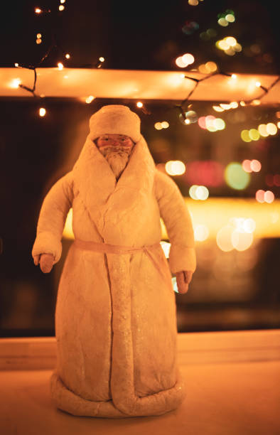 istock Santa Claus and Christmas tree 1358024928