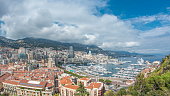 Monte Carlo city aerial panorama timelapse. View of luxury yachts and apartments in harbor of Monaco, Cote d'Azur