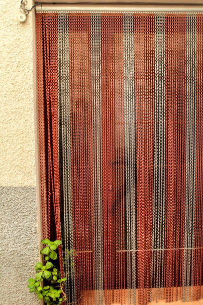 istock Red and white Striped curtain on door 1358032001