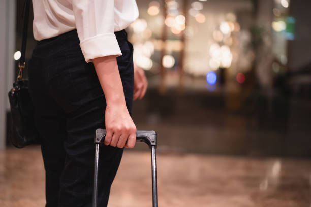 istock Woman walking in the hotel lobby. 1358033172