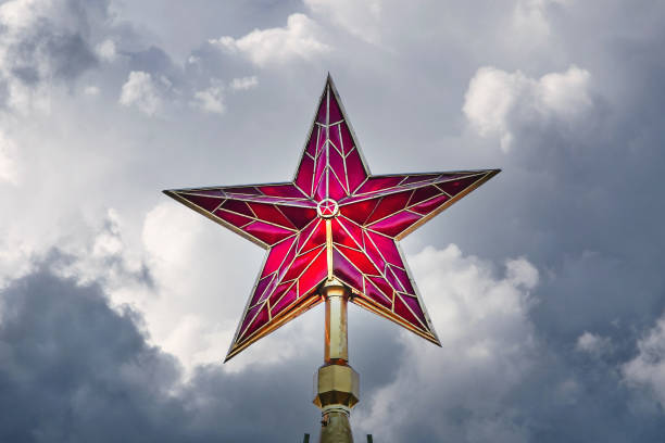 Moscow Kremlin red ruby star in the dark stormy sky Moscow Kremlin red ruby star in the dark stormy sky kremlin stock pictures, royalty-free photos & images