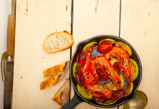 istock roasted shrimps with zucchini and tomatoes 1358041461