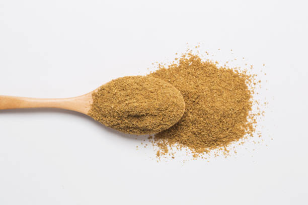 istock Coriander powder in wooden spoon 1358041469
