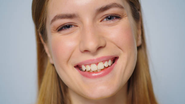 istock Closeup cheerful woman posing with happy emotions at camera in studio. 1358044120