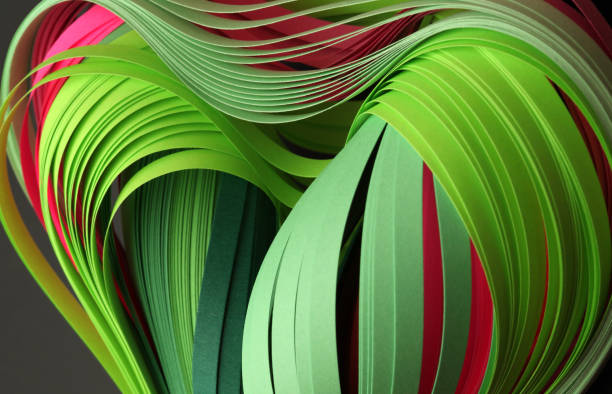 istock Abstract green and red neon color wave paper on texture black background. 1358047778