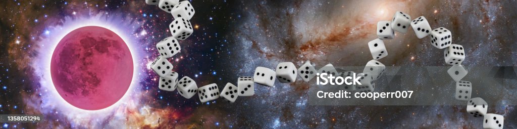 abstract image of a chain of dice on the background of a space landscape. abstract image of a chain of dice on the background of a space landscape. Eclipse of the sun Abstract Stock Photo