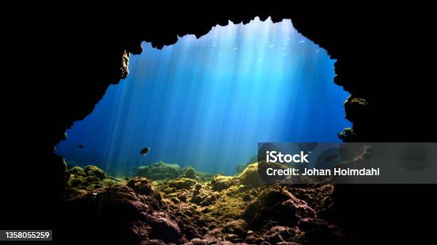Rays Of Light At Underwater Cave Entrance Stock Photo - Download Image Now - Cave, Underwater, Light - Natural Phenomenon