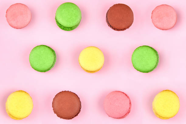 istock Bright multicolored cookies on a pink background. 1358055345