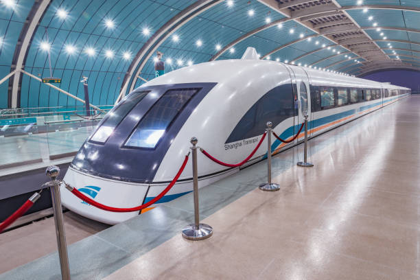 Shanghai Transrapid Maglev magnetic levitation train departs. Shanghai, China - January 02, 2017: Shanghai Transrapid Maglev magnetic levitation train departs. It is the first commercial high-speed maglev with cruising speed of 431 km per hour. maglev train stock pictures, royalty-free photos & images