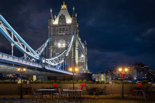 istock Low angle view of the Tower Bridge during a winter christmas night 1358059856