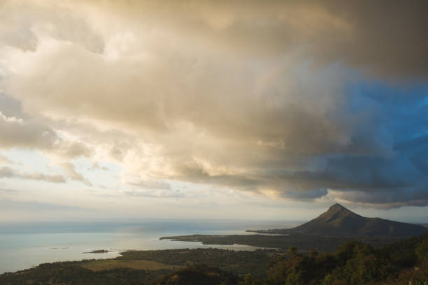 istock Nice view of the ocean, mountains and clouds. Mauritius Island. 1358065152
