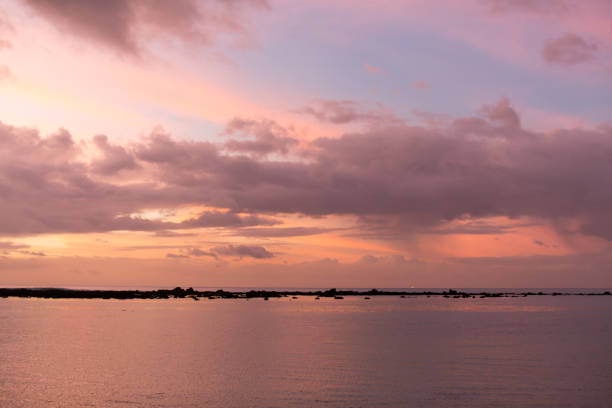 istock Aerial panoramic view of sunset over ocean. 1358065225