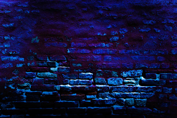 istock Neon wall. Dark blue night light background. Abstract bar brick neon texture. Lighting effect pink and blue on empty brick wall. 1358066038