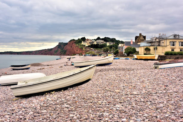 istock Boats on Budleigh Salterton Beach 1358067290
