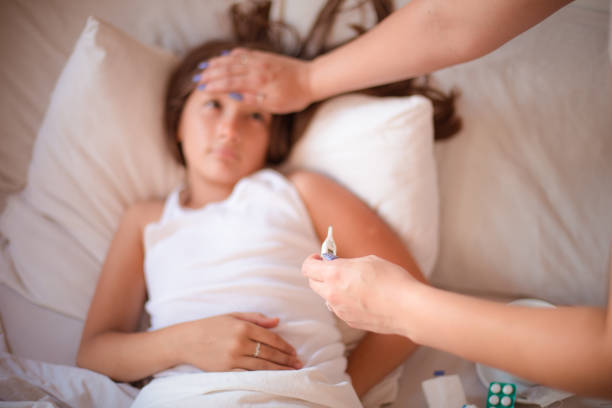 istock Looks like her temperature is coming down 1358067822