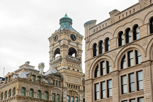 two landmark buildings in downtown milwaukee wisconsin of victorian and french second empire architectural styles