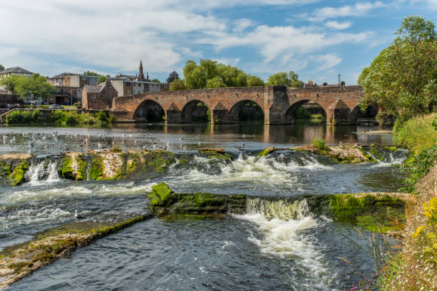 istock The River Nith flowing over the Caul weir in Dumfries, with the medieval Devorgilla Bridge in the background, Dumfries and Galloway, Scotland 1358072246
