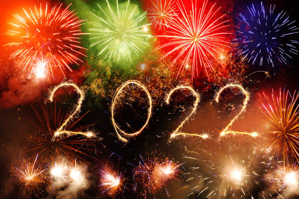 istock 2022 Happy New Year and Sparkle firework on black background 1358073157