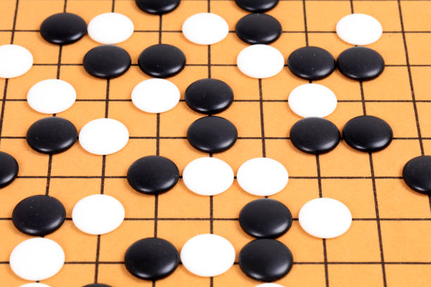 istock chinese game go,  Gobang and go game board 1358074213