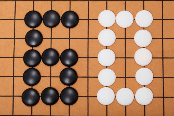 istock chinese game go,  Gobang and go game board 1358074214