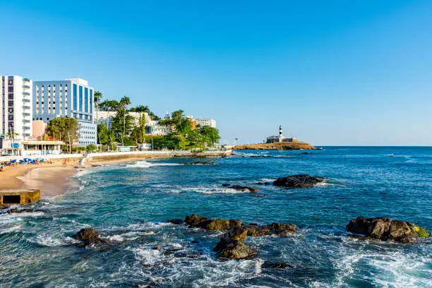 Famous Barra beach and lighthouse on the seafront of Salvador in Bahia, Brazil