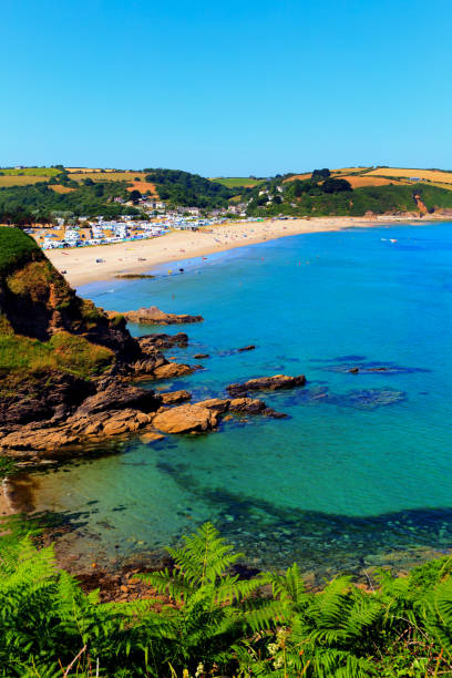 istock Pentewan Cornwall beach England UK beautiful blue sea and sky 1358076457