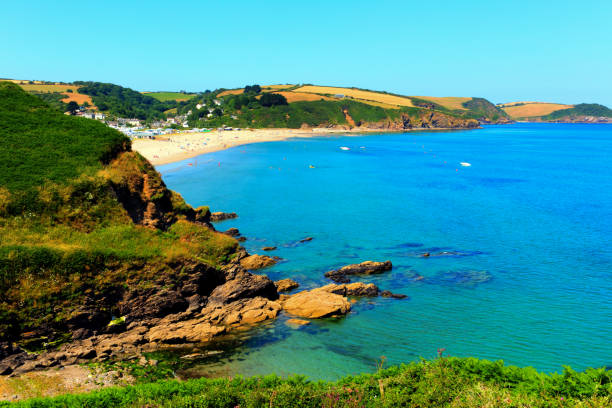 istock Pentewan Cornwall beach England UK beautiful blue sea and sky 1358076686