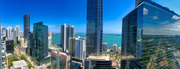 istock Panoramic aerial view of Downtown Miami skyline on a sunny day, - Panoramic view 1358076819