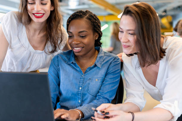 istock Young coworkers in modern office 1358078309