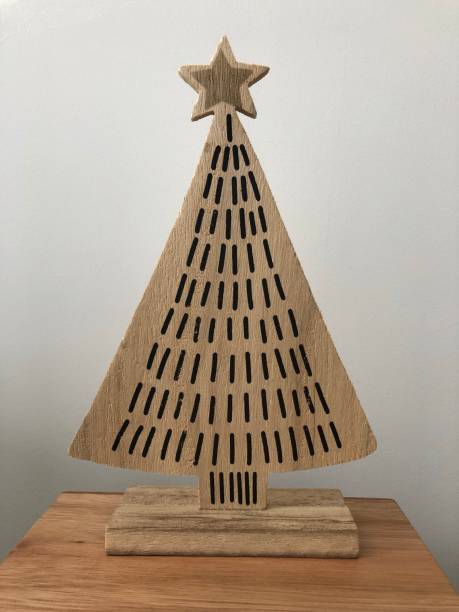 istock Minimalist wooden Christmas tree 1358078322