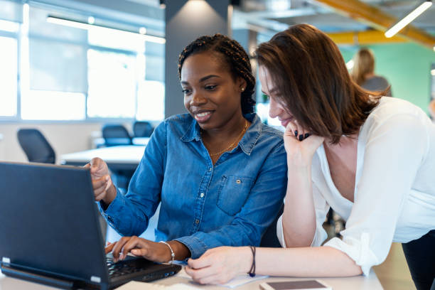 istock Young coworkers in modern office 1358078324