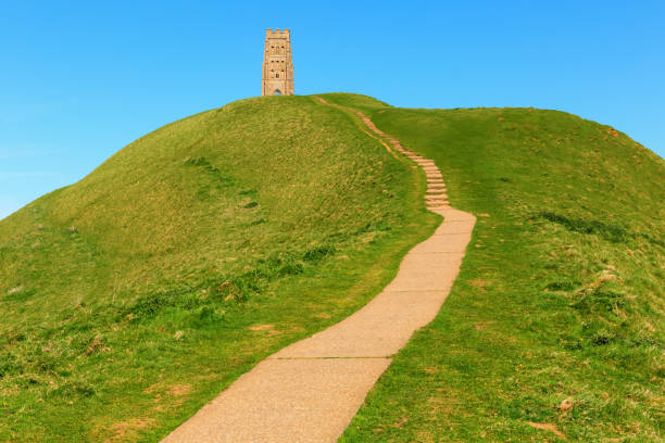 istock Glastonbury Tor Somerset with hill and path England UK 1358079787